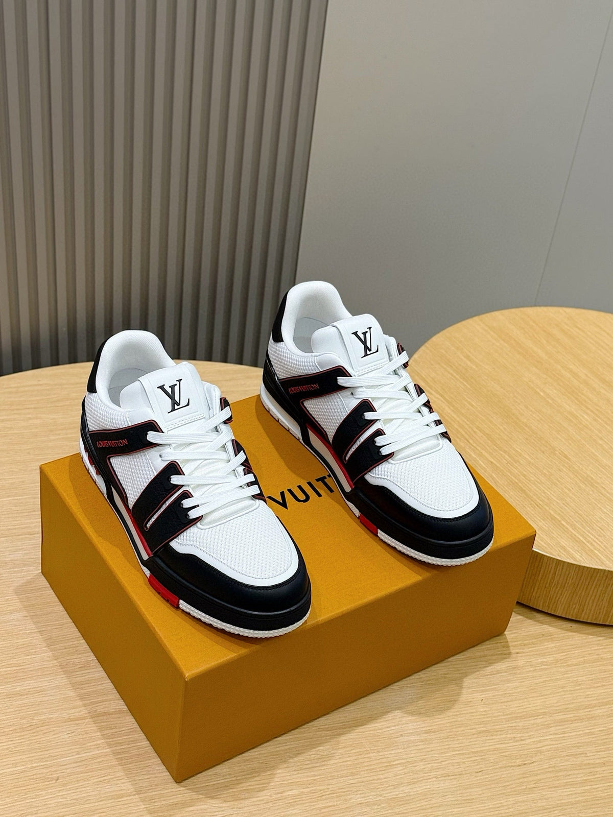 LV Trainer Sneakers In White, Black, And Red Colorway