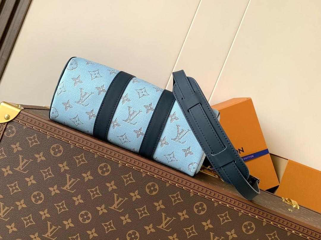 Keepall Bandouliere 25 Blue Monogram Heritage Canvas