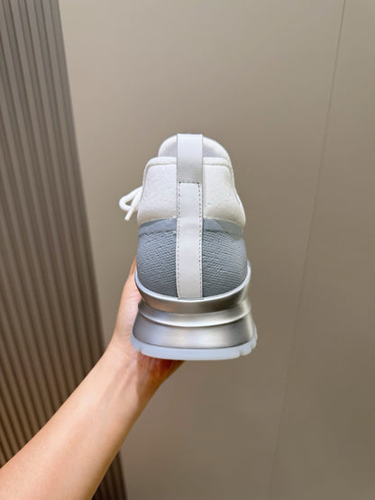 LV Runner Sneakers Featuring An Orange Toe Cap And a Silver Heel Accent