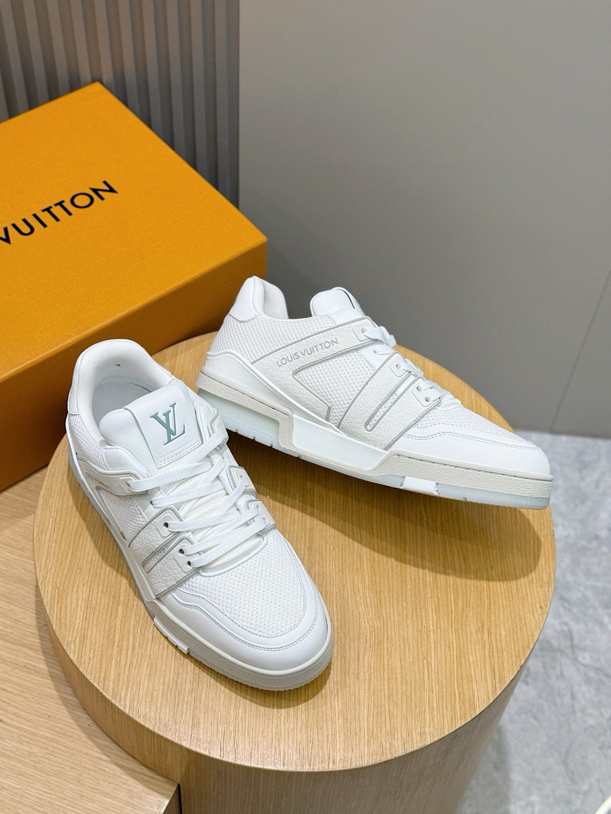 LV Trainer Sneakers Resting In White Colorway