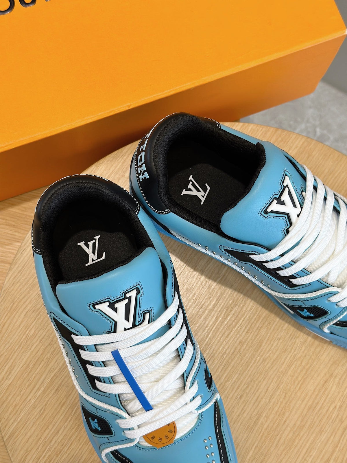 LV Trainer Sneaker In Teal Blue And Black Colorway