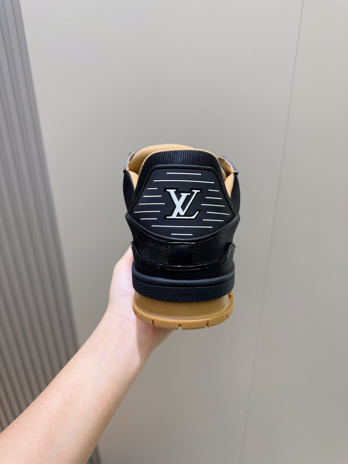 LV Trainer Sneaker In Black Grained Leather And Tan Sole Colorway