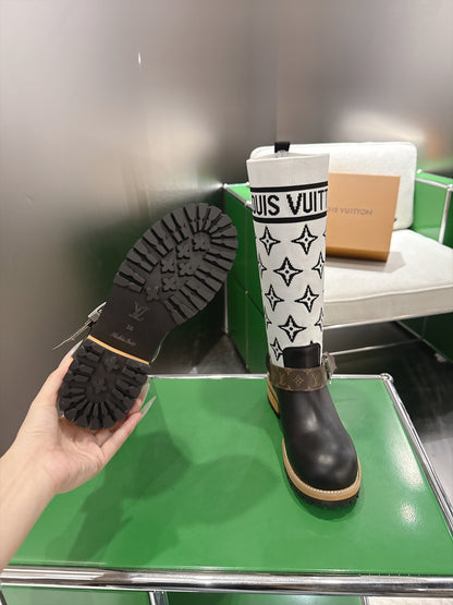 Tall Boots With Striking Black Lower Boot with White Monogram Shaft