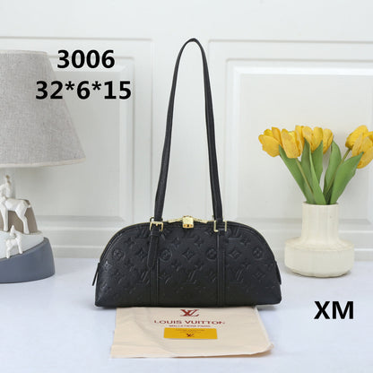 Elegant Dome Shoulder Bag – Monogram Embossed