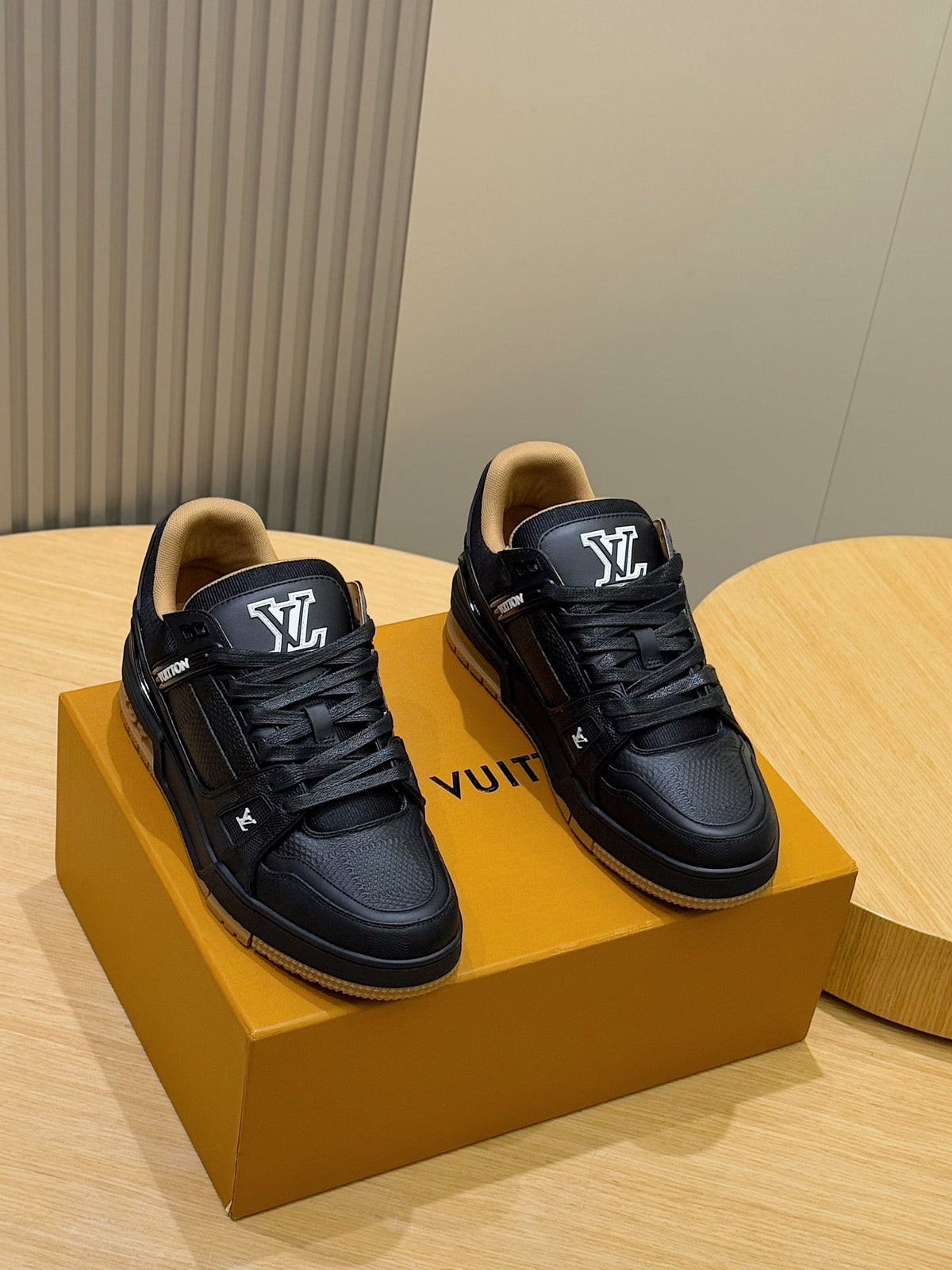 LV Trainer Sneaker In Black Grained Leather And Tan Sole Colorway
