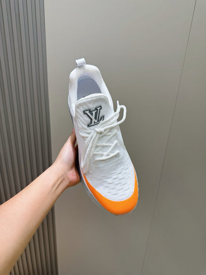 LV Runner Sneakers Featuring An Orange Toe Cap And a Silver Heel Accent