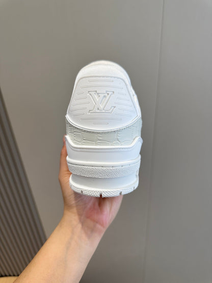 LV Trainer Sneakers In White And Iconic Signature On The Side