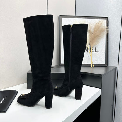 Black Suede Knee-High Heeled Boots Featuring A Square Toe And Gold-Toned Buckle Detail