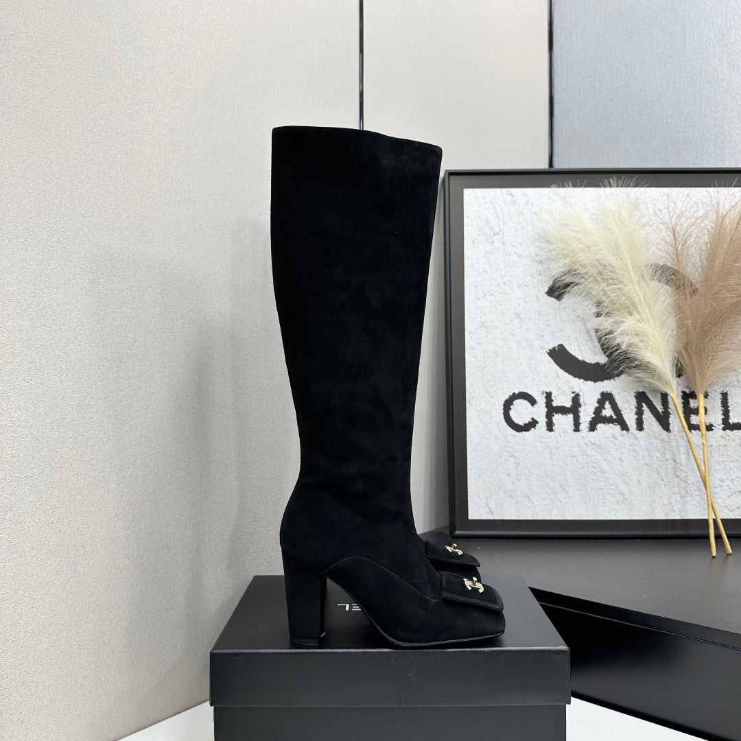 Black Suede Knee-High Heeled Boots Featuring A Square Toe And Gold-Toned Buckle Detail
