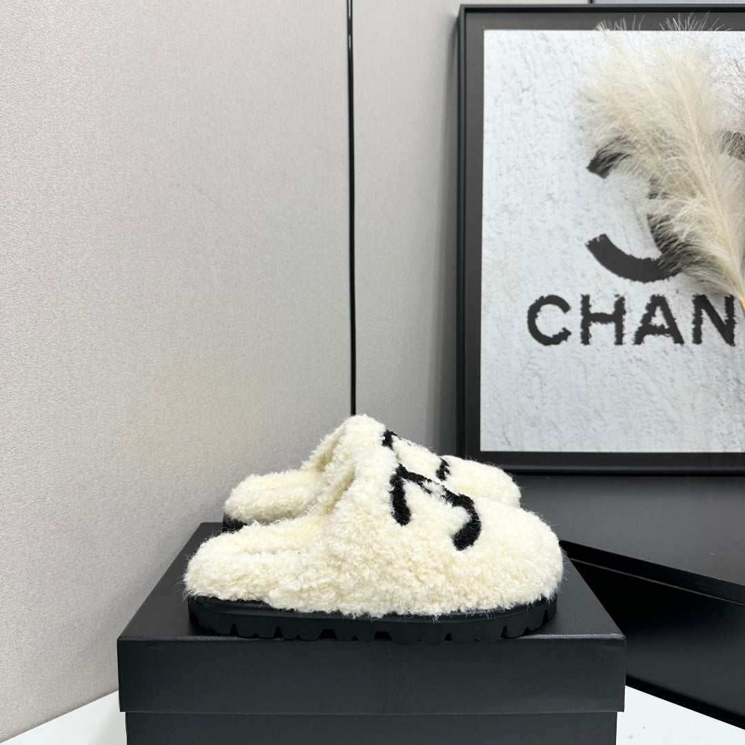 Cream Shearling Mule With A Chunky Black Lug Sole