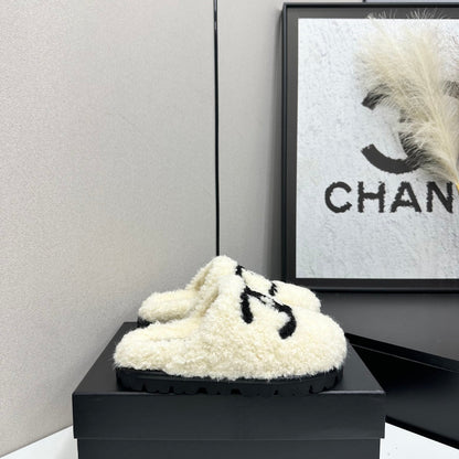 Cream Shearling Mule With A Chunky Black Lug Sole