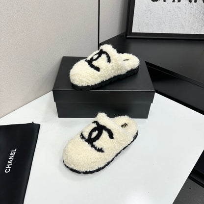 Cream Shearling Mule With A Chunky Black Lug Sole