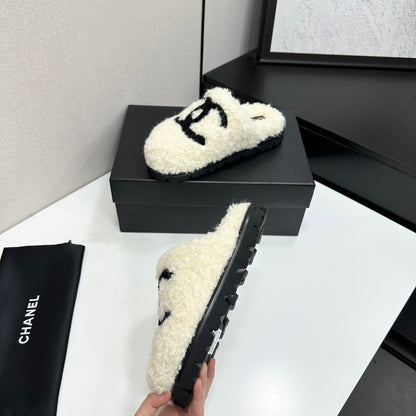 Cream Shearling Mule With A Chunky Black Lug Sole