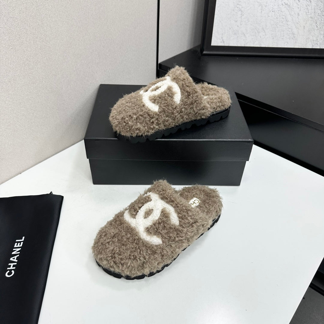 Cream Shearling Mule With A Chunky Black Lug Sole