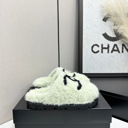 Cream Shearling Mule With A Chunky Black Lug Sole