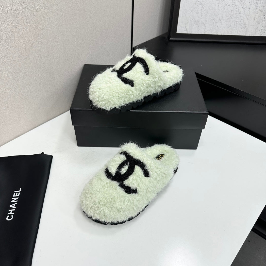 Cream Shearling Mule With A Chunky Black Lug Sole