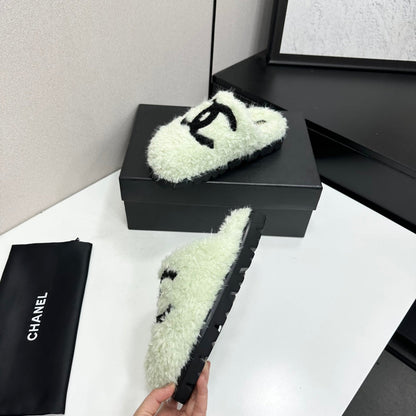 Cream Shearling Mule With A Chunky Black Lug Sole