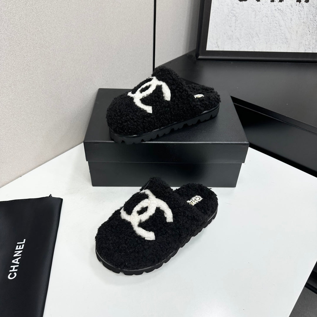 Cream Shearling Mule With A Chunky Black Lug Sole