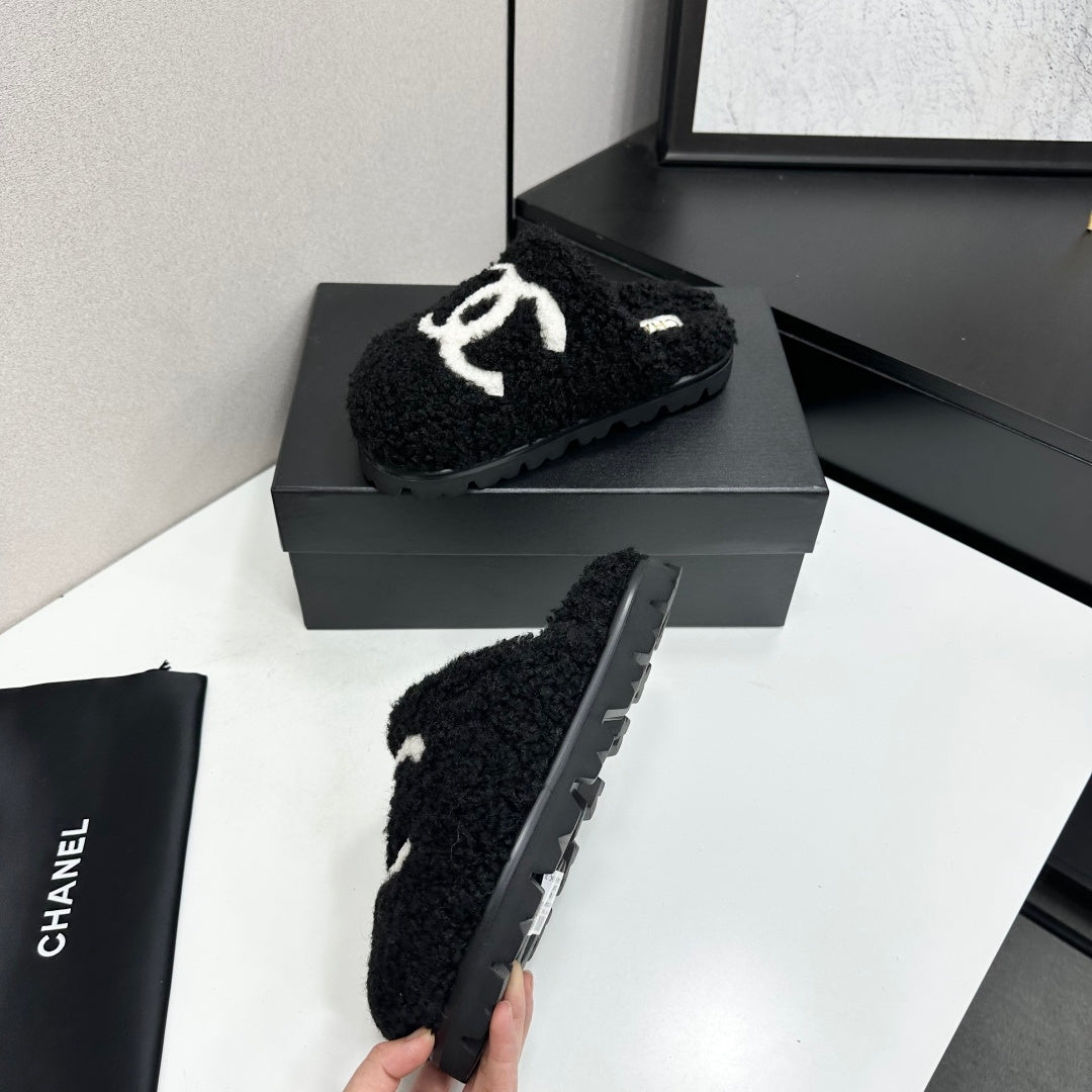 Cream Shearling Mule With A Chunky Black Lug Sole