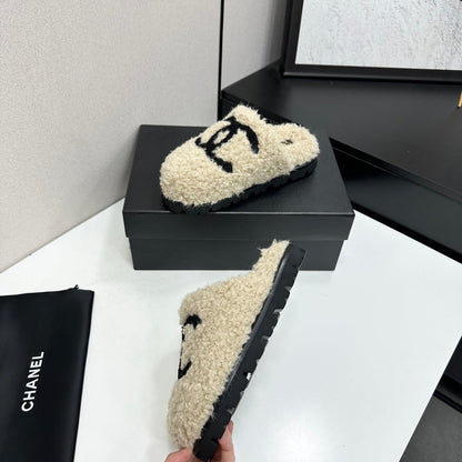 Cream Shearling Mule With A Chunky Black Lug Sole