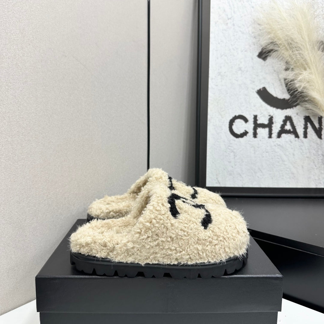 Cream Shearling Mule With A Chunky Black Lug Sole