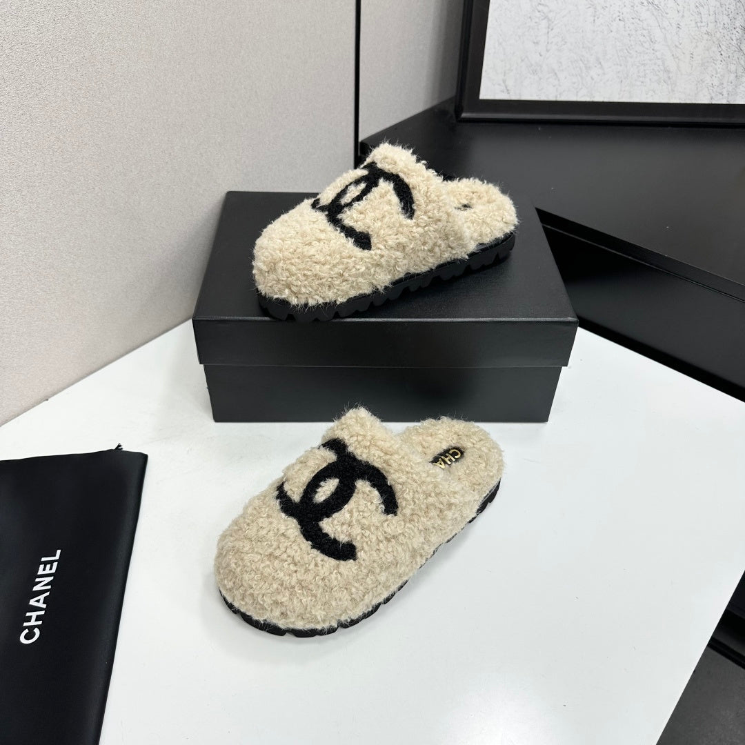 Cream Shearling Mule With A Chunky Black Lug Sole