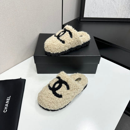 Cream Shearling Mule With A Chunky Black Lug Sole