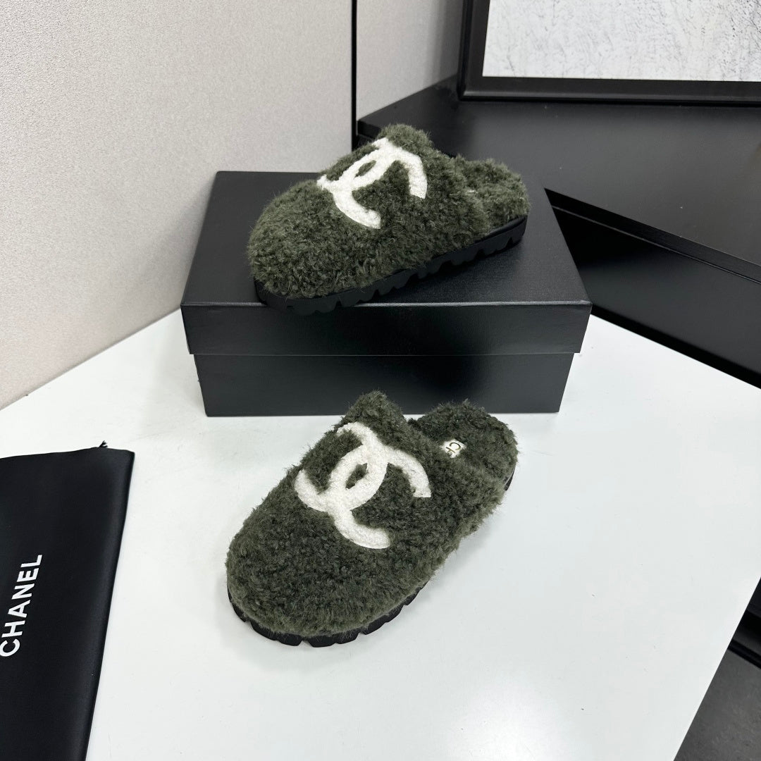 Cream Shearling Mule With A Chunky Black Lug Sole