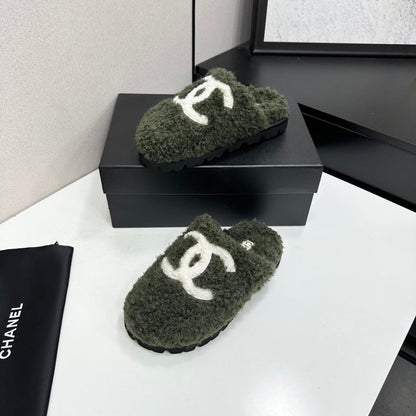Cream Shearling Mule With A Chunky Black Lug Sole