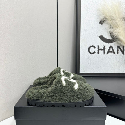 Cream Shearling Mule With A Chunky Black Lug Sole