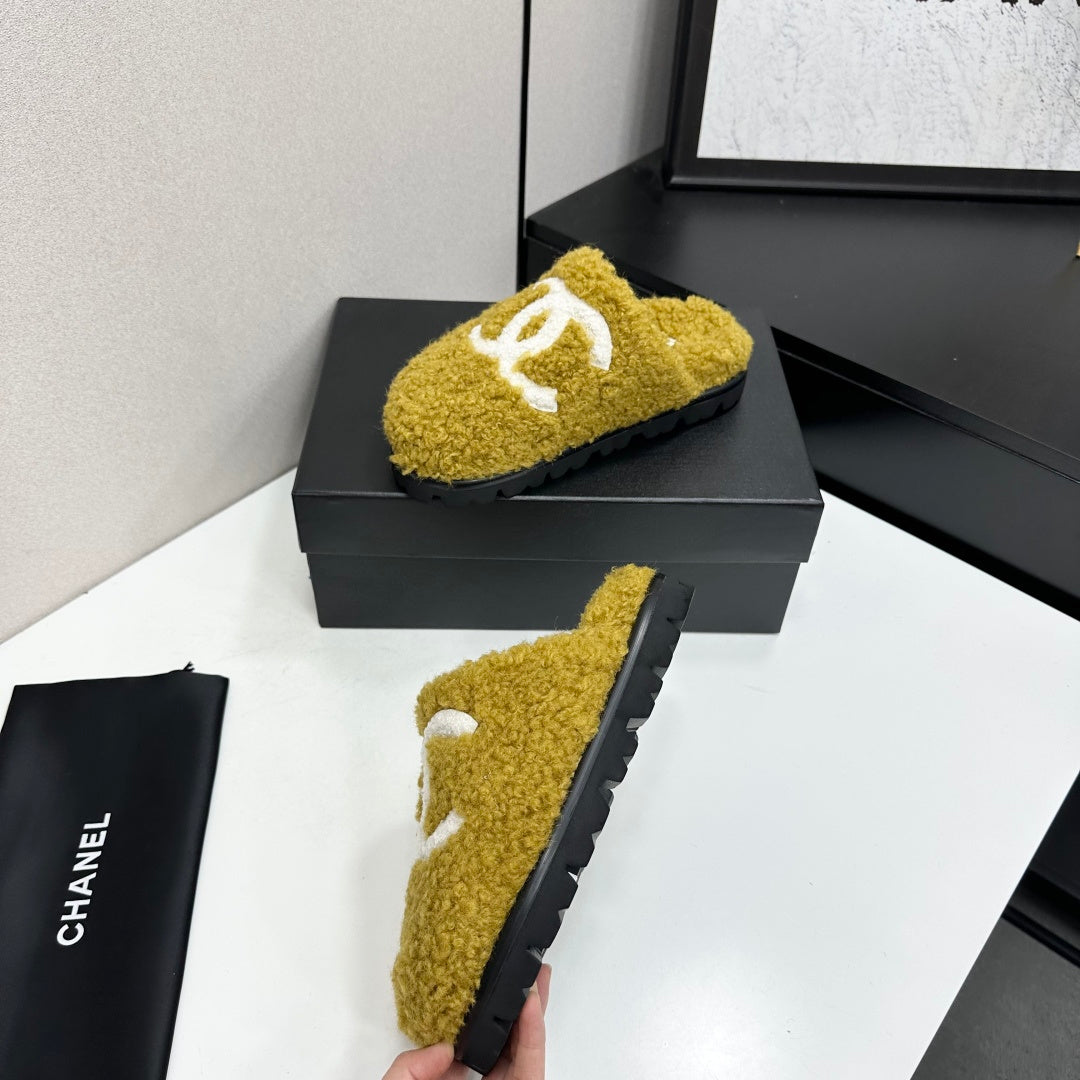 Cream Shearling Mule With A Chunky Black Lug Sole