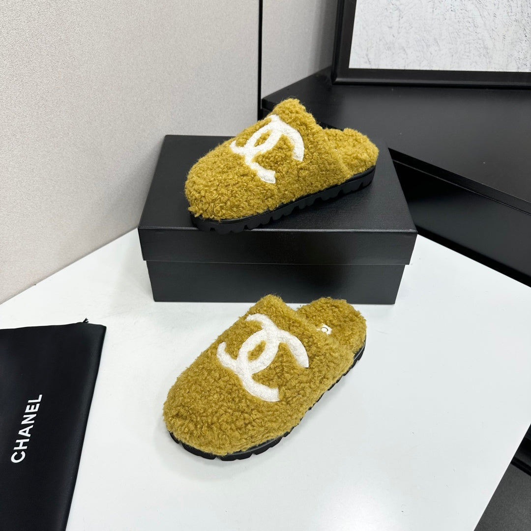 Cream Shearling Mule With A Chunky Black Lug Sole