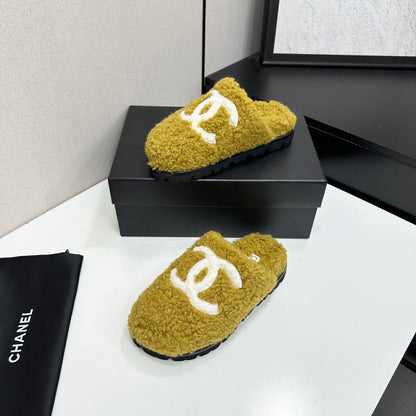 Cream Shearling Mule With A Chunky Black Lug Sole