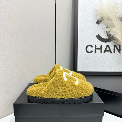 Cream Shearling Mule With A Chunky Black Lug Sole