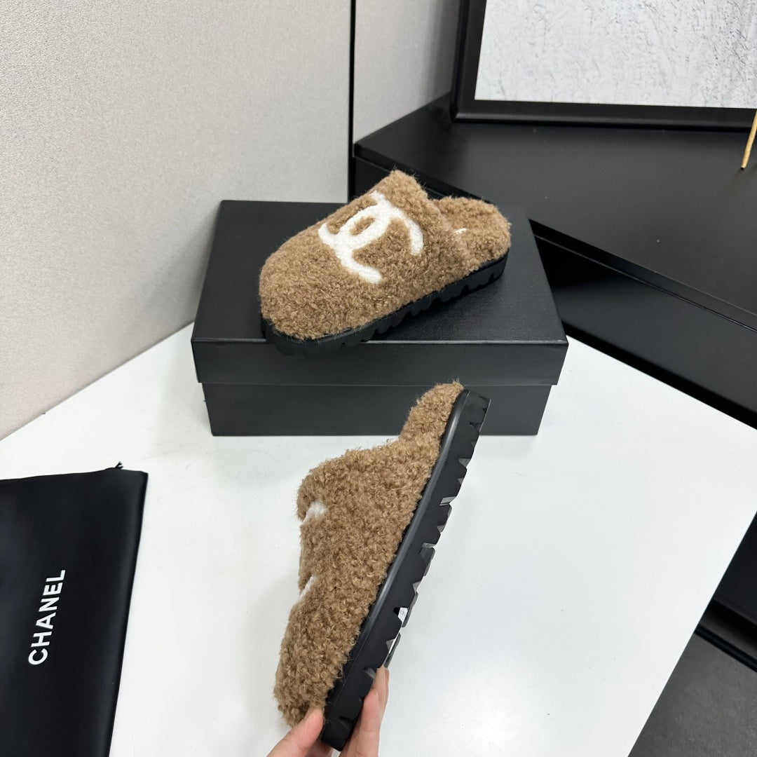 Cream Shearling Mule With A Chunky Black Lug Sole