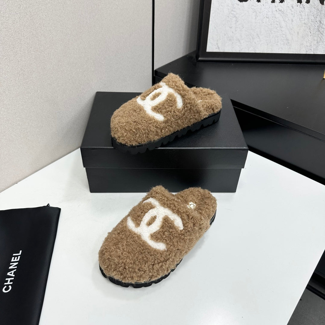Cream Shearling Mule With A Chunky Black Lug Sole