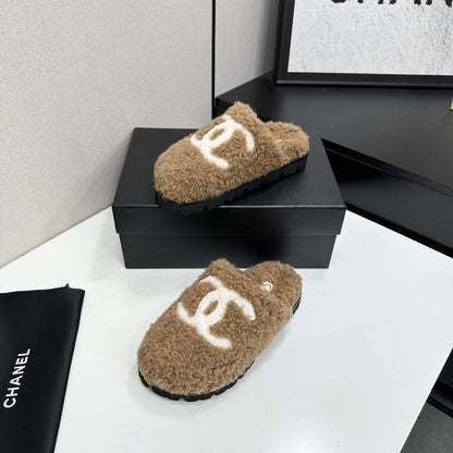Cream Shearling Mule With A Chunky Black Lug Sole