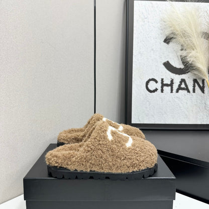 Cream Shearling Mule With A Chunky Black Lug Sole