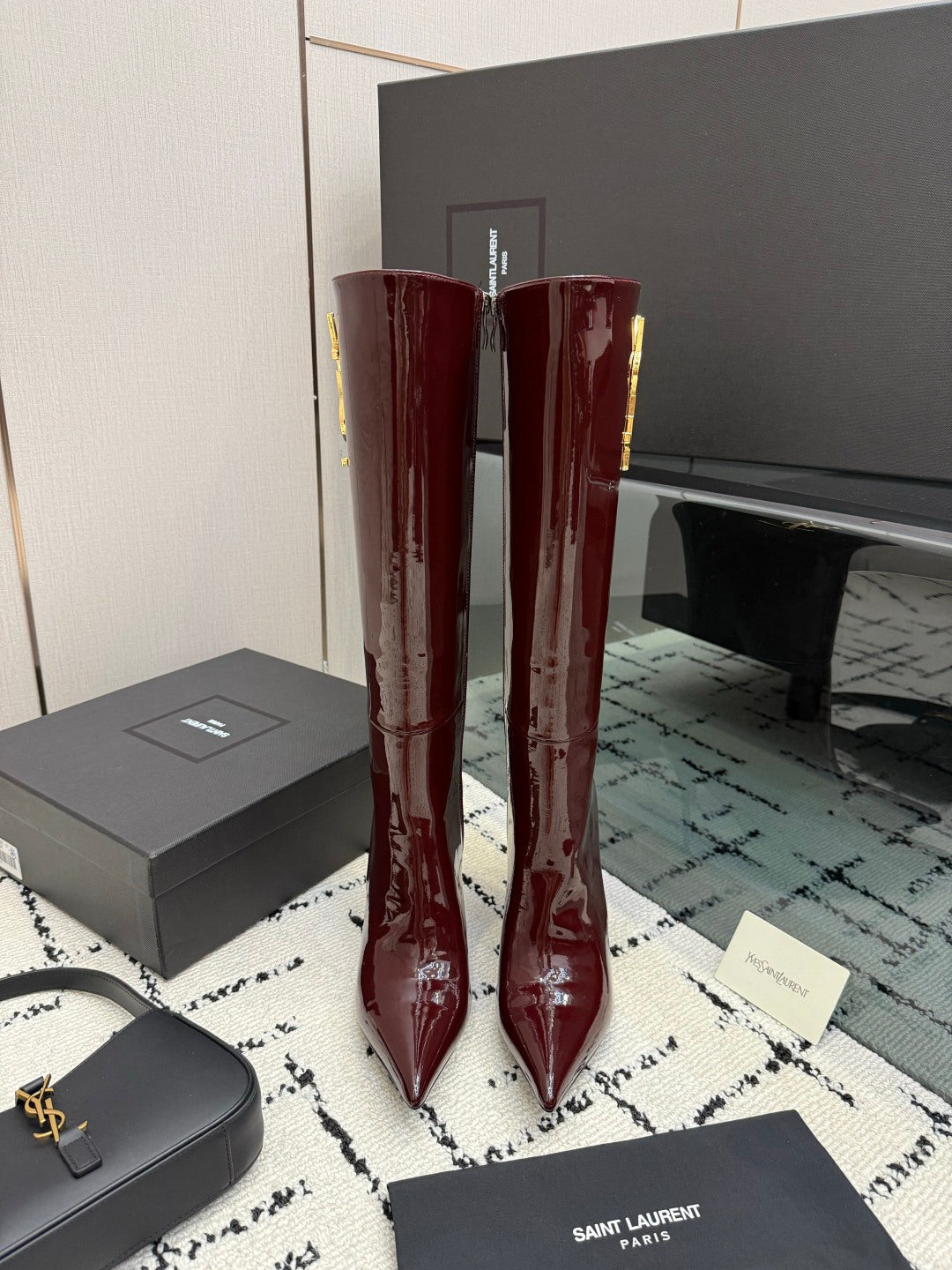 Shiny Knee-High Boots Featuring The Iconic Metallic Gold Cassandre Logo