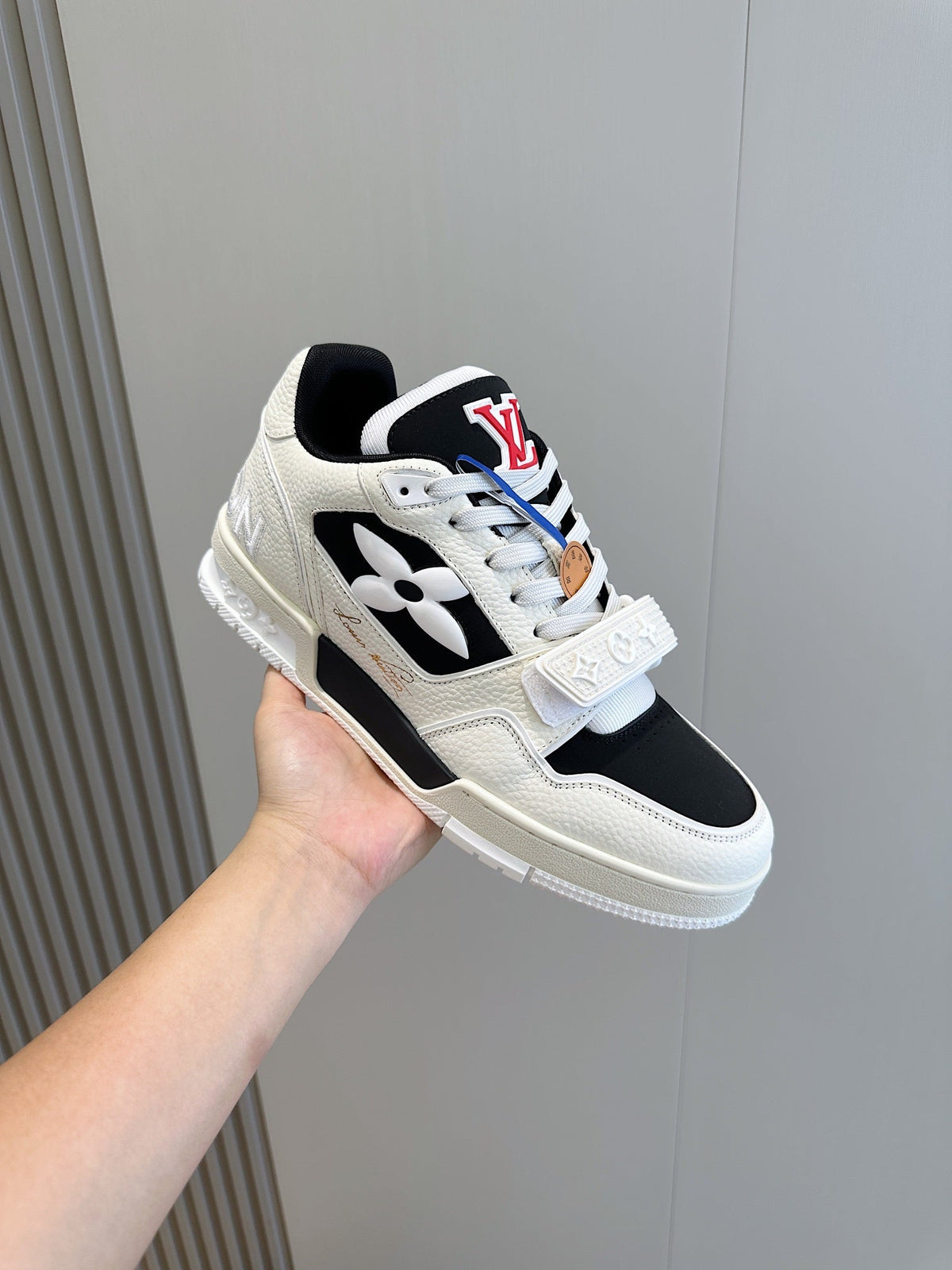 LV Trainer Sneakers In Cream And Black Colorway