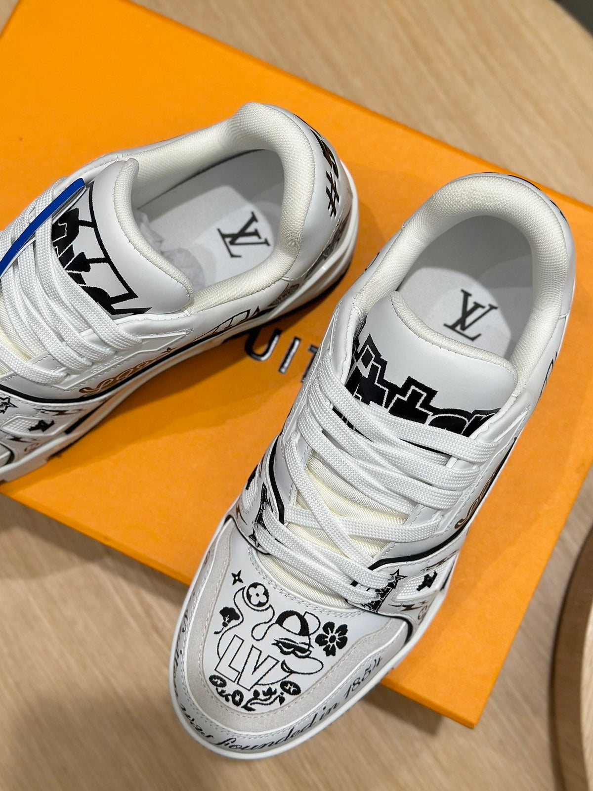 LV Trainer Comic Motifs Sneakers