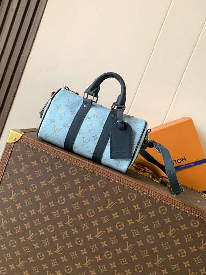 Keepall Bandouliere 25 Blue Monogram Heritage Canvas
