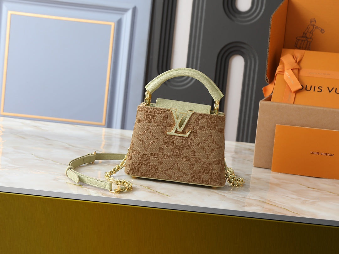 Capucines Handbag