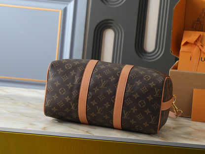 Keepall Bandouliere Monogra Canvas Handbag