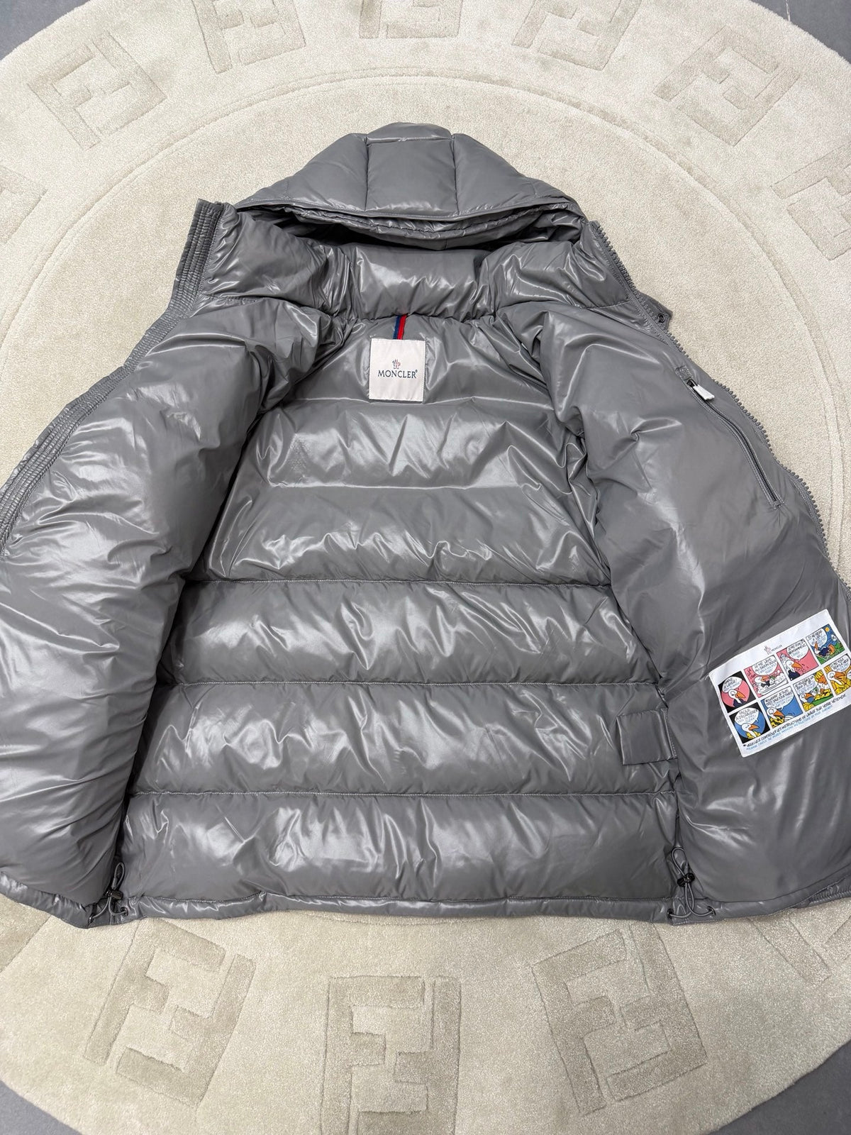Gray Puffer Jacket Featuring Boudin Quilting And The Sleeve Logo Patch