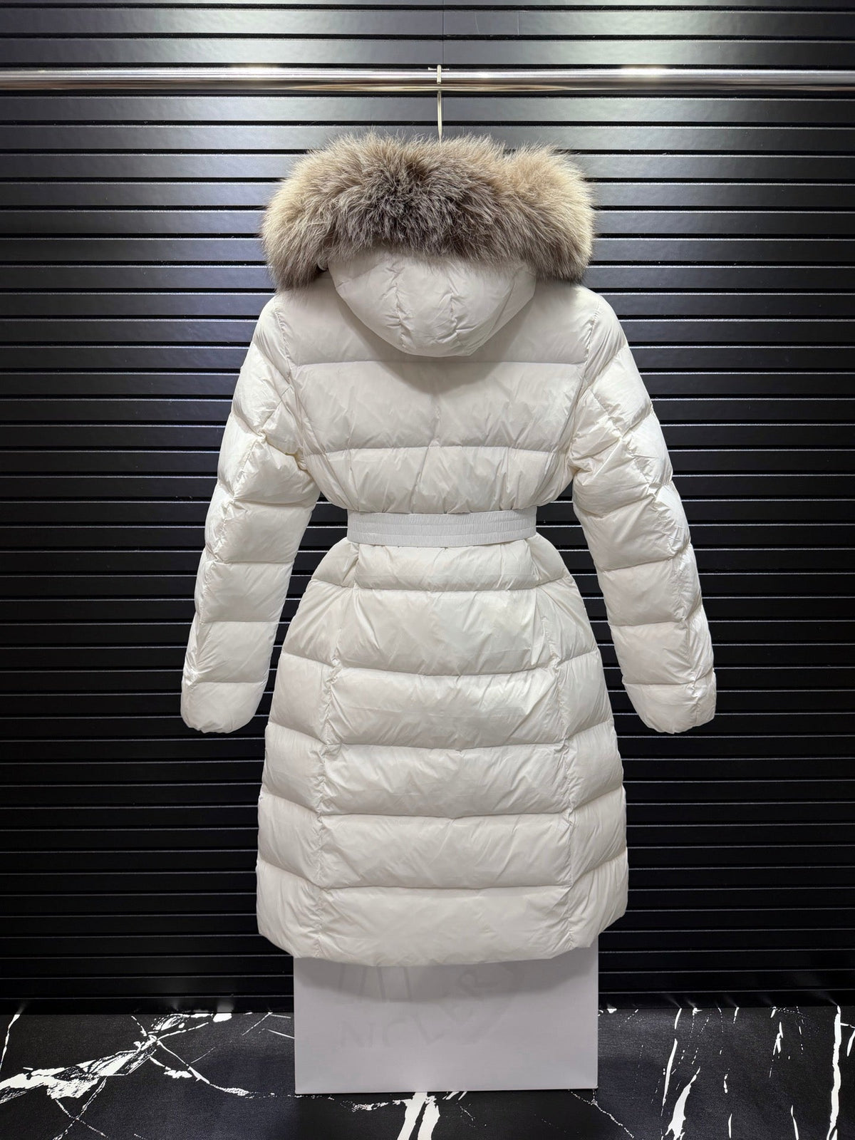 Long White Quilted Down Coat Featuring A Belted Waist And a Fur-Trimmed Hood
