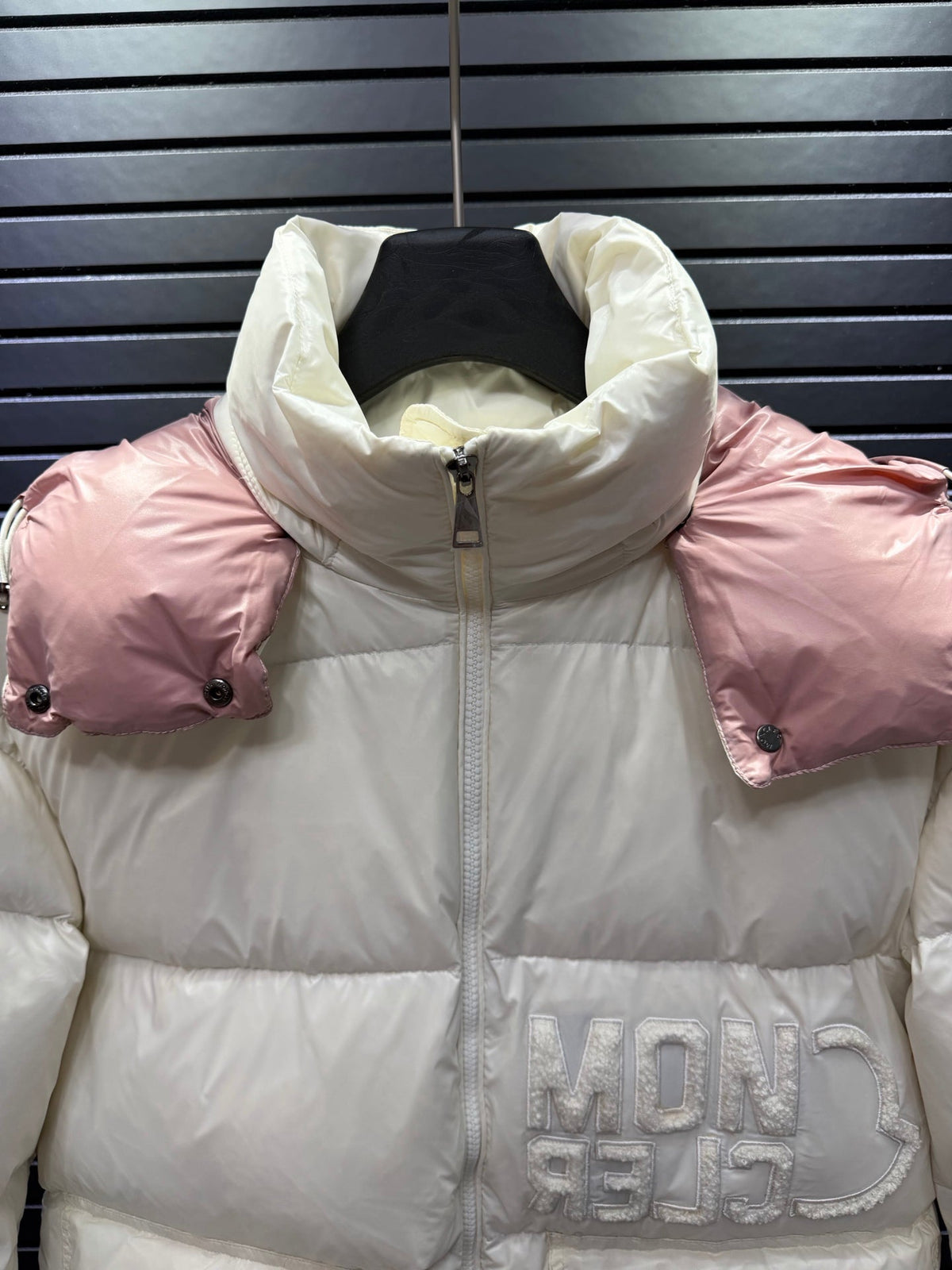 White And Pink Short Puffer Jacket With Embossed Letter Branding On The Chest